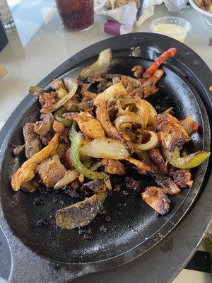 Half eaten plate of the Fajita El Rey.