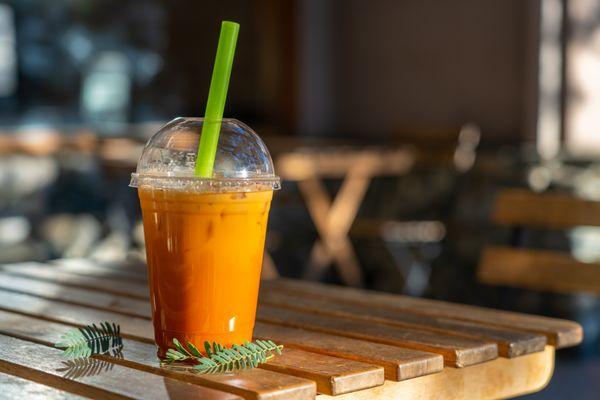 Classic Thai Iced Tea! This sweet and caffeinated tea latte is sure to make your day. Remember, you can add boba to any drink at Norema!