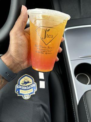 Mango tea with strawberry popping pearls