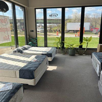 Inside the mattress store looking at the natural latex mattresses.