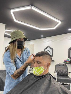 Stephanie giving a fresh haircut