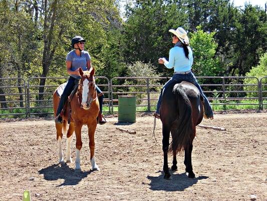 Miss Leigh providing instruction in the arena.