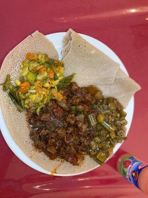 Doro Tibs over injeera bread