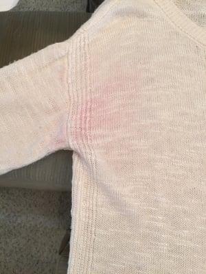 Red stains from Montebello cleaners washing my white garments with something red