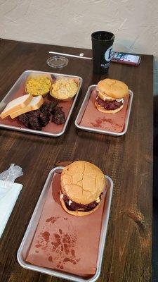 Brisket burgers with fried green tomatoe,  Also brisket burnt ends with Mac n cheese, green chili corn casserole