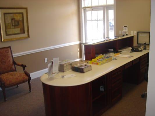 Interior photos of Carolinas Metro Realty and CMR Property Management.