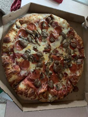 Mushroom sausage and pepperoni pizza