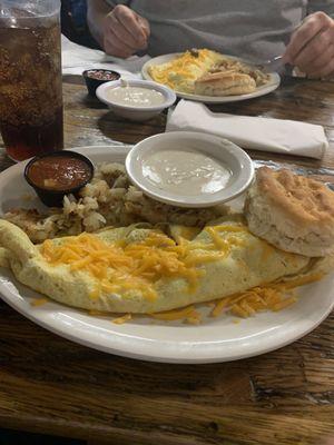 Breakfast on the weekends!  Omelette, hash browns, biscuits and gravy.