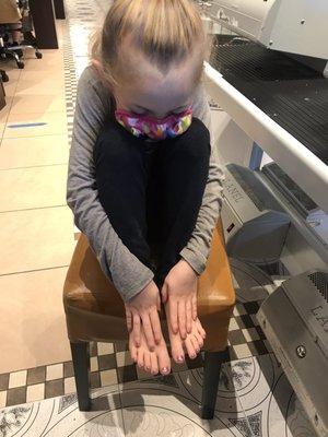 My very happy 6 year old daughter after her mani pedi!