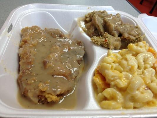 Fried pork chop, dressing w/ gravy, Mac & cheese