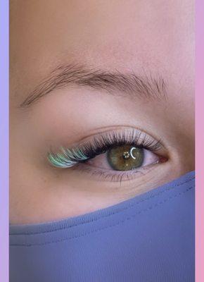 Volume lash extensions with a glow in the dark lime green pop by Amanda @skincarebya.q