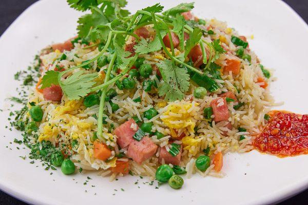 Spam Fried Rice- stir fired rice with fresh beaten eggs,peas,carrots, green onions and SPAM