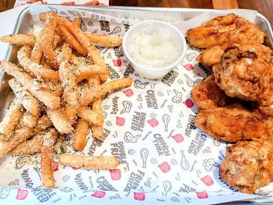 6 piece Wings with Garlic Soy sauce, seasoned (Parmesan) french fries served with pickled radish