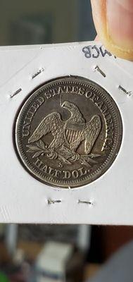 This is the reverse of the Seated Liberty 50 cent coin.