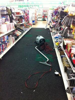 What employee leaves a vacuum in the middle of the aisle??