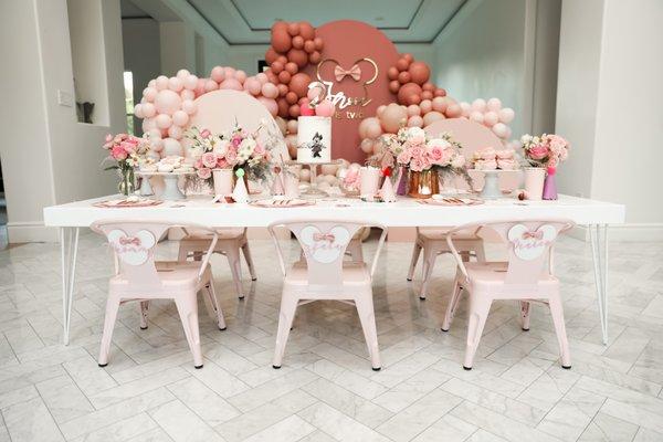 Minnie birthday party! Pink blake chairs, white mid century modern kids table