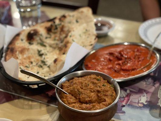 Bengan Bharatha, chicken Murg Makhani, and garlic naan