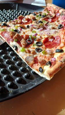 Crust and toppings together are less than,q inch thick, $31.