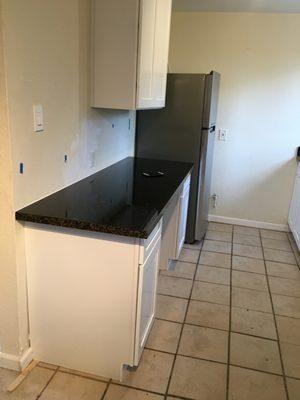 Desk area countertop and cabinets