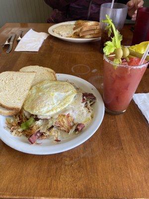 Corned beef hash and an awesome Bloody Mary! Excellent food and service!