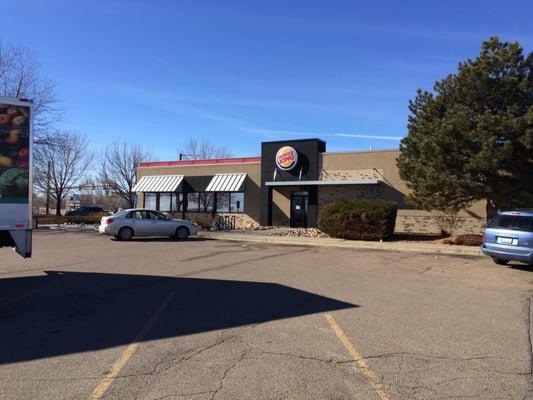 Storefront photo. The store is in the shopping center at the NE corner of Courtesy Road (96th Street) and South Boulder Road.