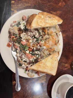 Egg white gyro omelette add spinach and mushroom. Rye toast.