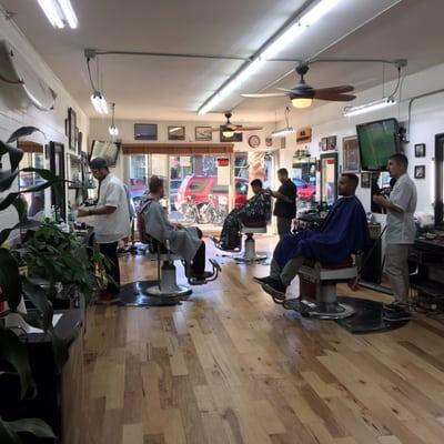 4 Barbers working hard, if you show up and there's and line just wait, it's worth it.