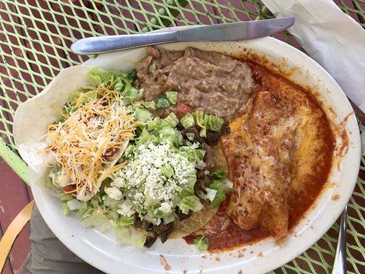 The combo with carne asada tostado, chicken tacos and cheese enchilada with red sauce. Delish.