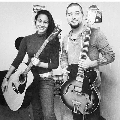 John and one of his guitar students