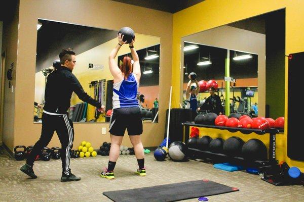 While doing a photoshoot for the owner of the gym I personally witnessed Fitness Trainer Brandi Jackson very focused and hard at work.