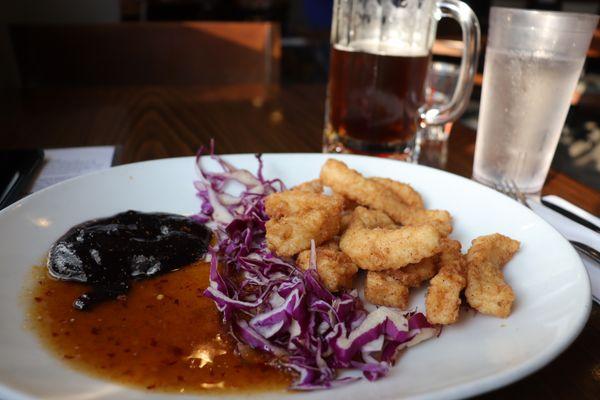 Calamari $15
 
 Crispy buttermilk breaded calamari served with spicy blueberry and orange chipotle sauce.