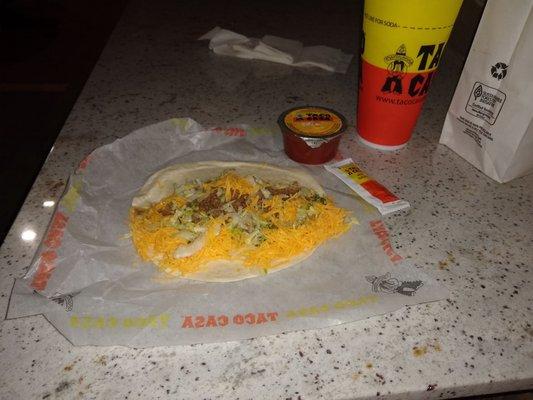 Soft taco ($1.99+tax) and side of salsa ($0.49+tax).