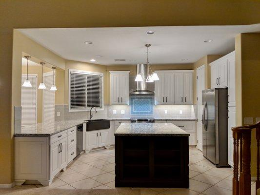 kitchen remodel (the dark island has open shelves on this side)