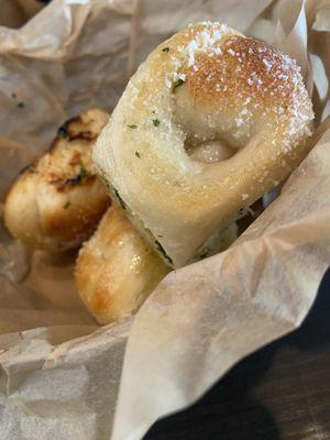 Garlic knots are light and delicious! The red sauce for dipping is fabulous!