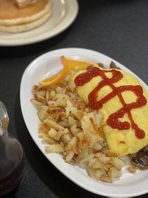 Omelette with two pancakes. Huge portion!