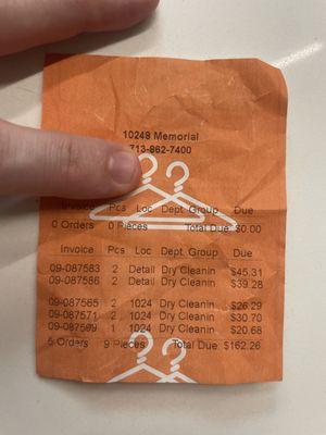 Receipt for dry cleaning of 9 articles of clothing, no alterations or special requests.