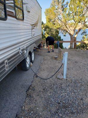 Easy electric plug in at specified RV site. They will show remember to ask..