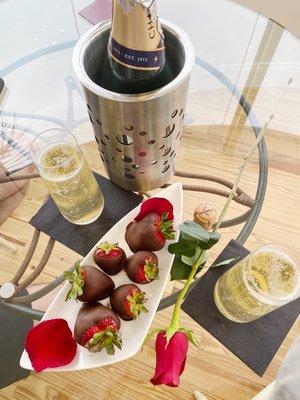 A whole bottle of champagne and chocolate covered strawberries to round out our couples spa day