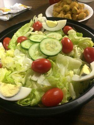 Salad with cucumbers tomato and egg, no cheese. They have other salads, and also different selections of dressings.