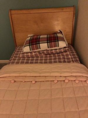 My bed in the guest bedroom upstairs