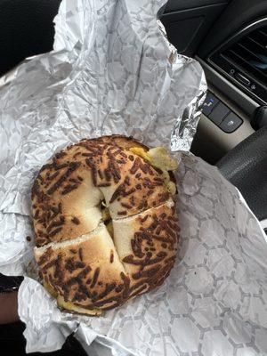 Asiago and cheese bagel with egg