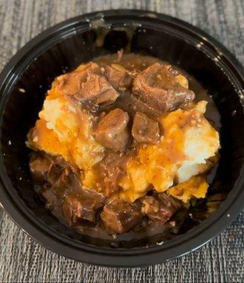 Southern Comfort... Yummy cornbread topped with homemade mashed potatoes and slow cooked beef and gravy