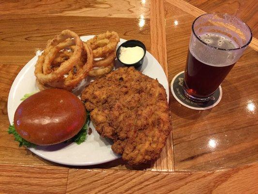 Pork tenderloin with house cut onion rings.