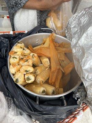 These are green chili & cheese tamales , the red ones are pork