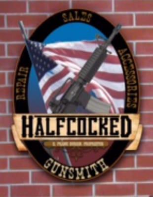 Halfcocked Gunsmith logo out front of facility.