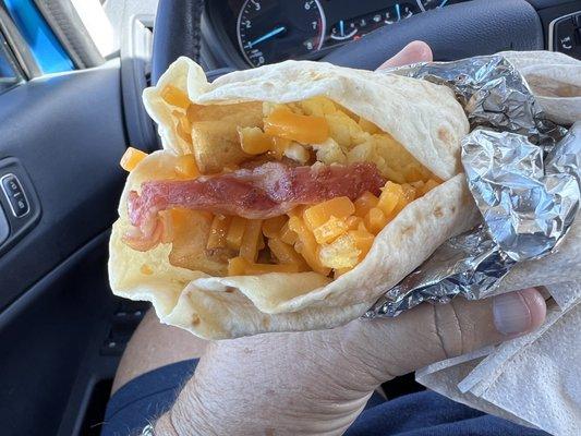 Bacon, egg, cheese, & potato breakfast burrito