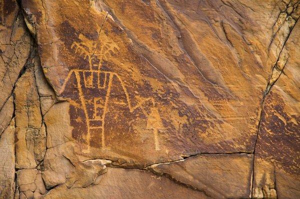 Raft the river and see historical artifacts, like these actual petroglyph!