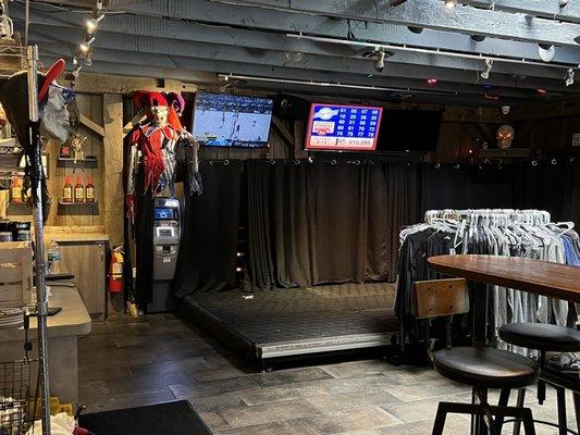 View of stage, t-shirt and hot sauce sales