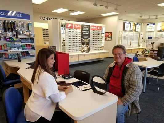 Our first patient picking up his new glasses