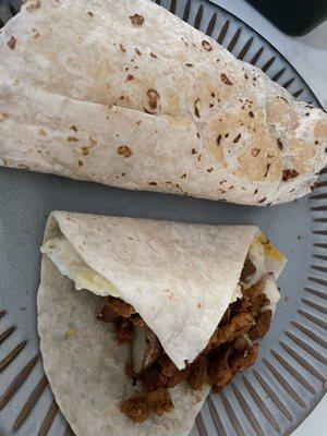 A Carne Asada Loaded Breakfast Meat Quesarito and a Chicken Breakfast Cheese Taco.